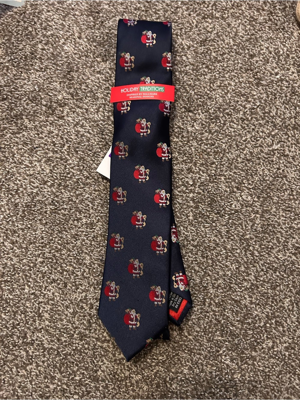 Holiday Traditions Navy Tie with Red Santa Motif